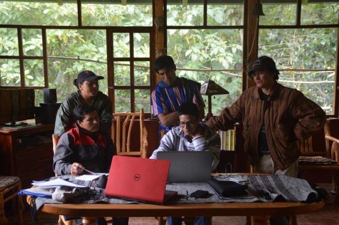 Forest Guards learning camera trapping techniques