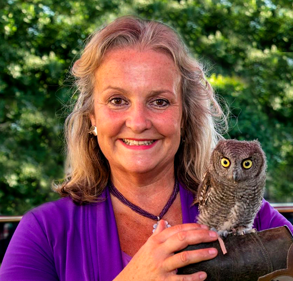 Megan Witty with owl Rainforest Concern